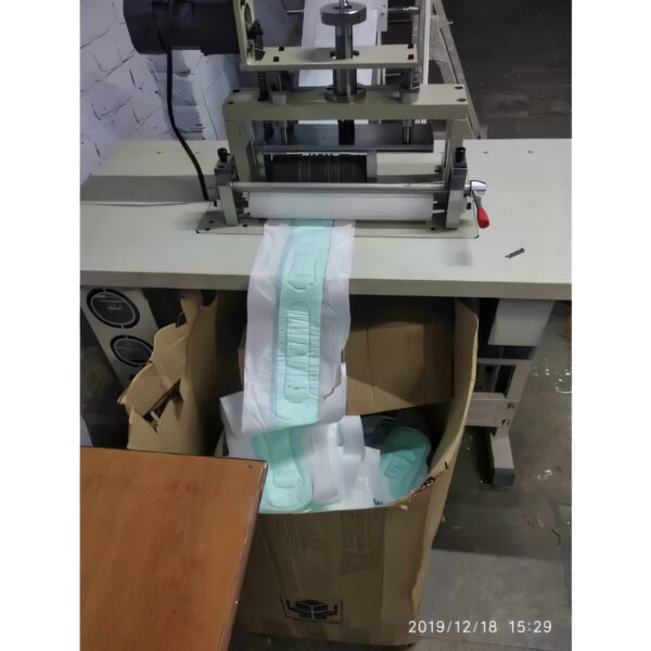 semi automatic sanitary napkin making machine